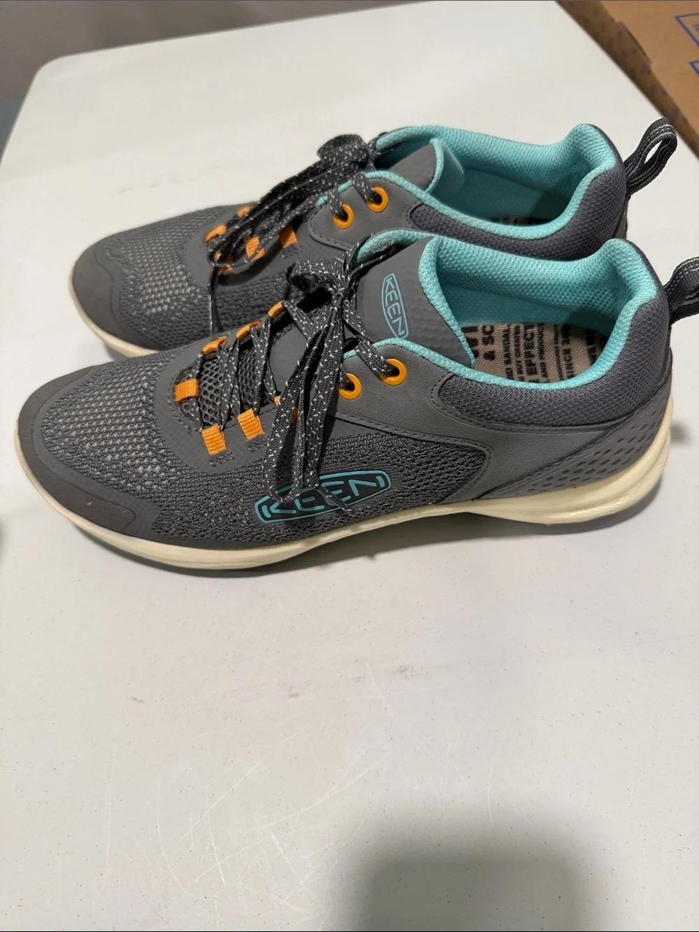 Keen Women’s Gray Sneakers with Teal Lining and Orange Accents